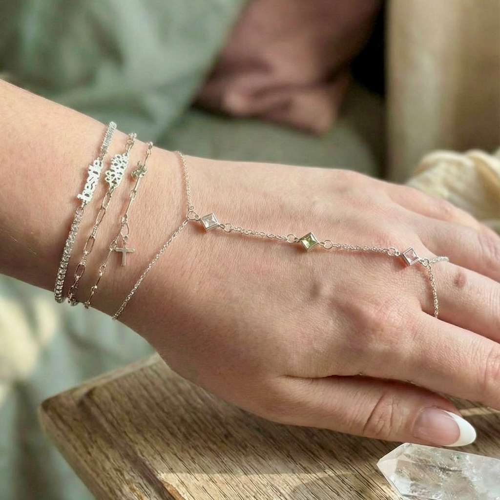 Heather's hand chain with layered bracelets